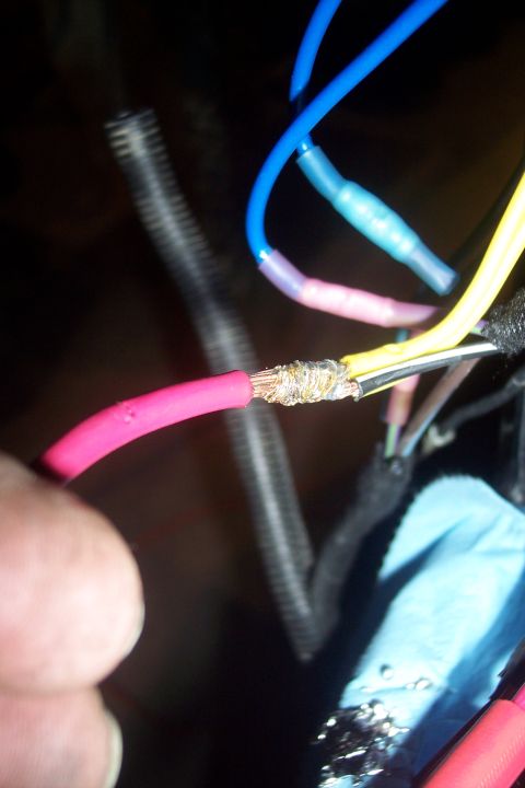 1995 Ford Bronco - Electrical wiring repair with heat shrink connectors on multiple wires.