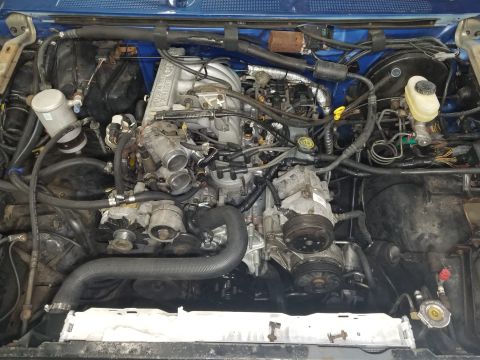 1989 Ford Bronco - I still have to run the silicone vacuum lines; mount the charcoal canister, and install the plastic reservoir; but the engine is pretty muc…