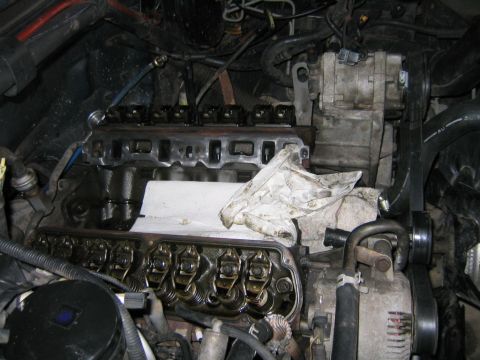1994 Ford Bronco - Close-up view of an engine with internal components exposed, indicating maintenance or repair work.