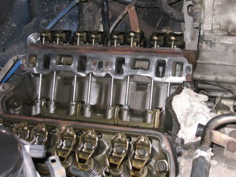 1994 Ford Bronco - Engine valve train components, including rocker arms and pushrods, are shown in detail.