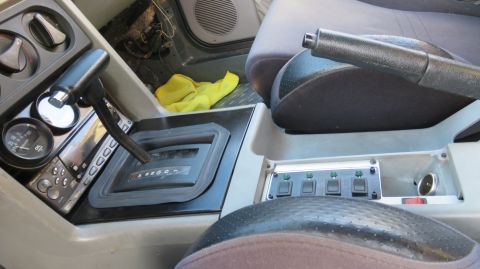 1988 Ford Mustang - Interior view of a 1988 Ford Mustang, highlighting the center console and shifter area.