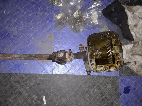 1994 Ford Bronco - A close-up view of a worn steering gear assembly, showing its internal components.