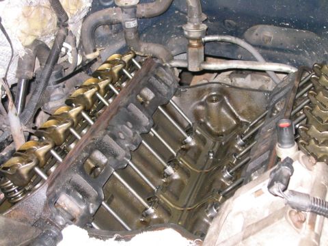 1994 Ford Bronco - Close-up view of an engine's internal components, with valve covers off.