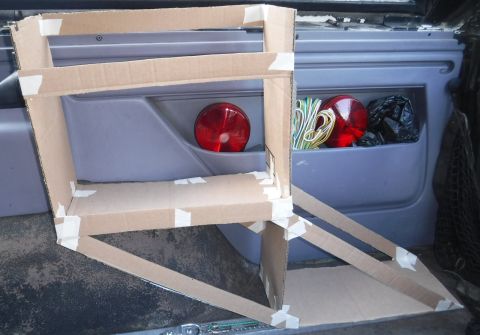 1992 Ford Bronco - Dual jerry can carrier mock-up. Will have three anchor points (wheel well hole for interior tire carrier, 2x topper bolts along bed rail) a…