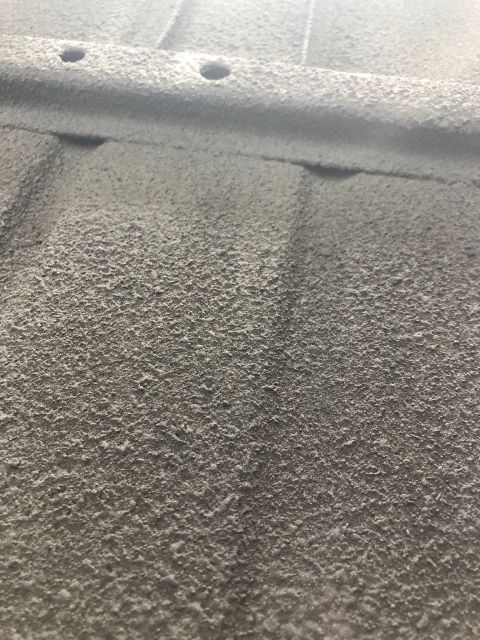 1992 Jeep Wrangler - Textured underbody coating shows a rough, porous surface with some raised imperfections.