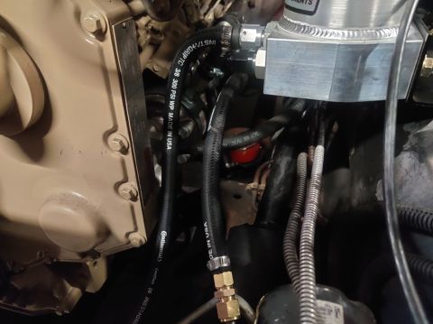 1996 Ford Bronco - 20200320 - Power steering lines are plumbed in and completed. Auxiliary port is capped as shown at the top of the photo.