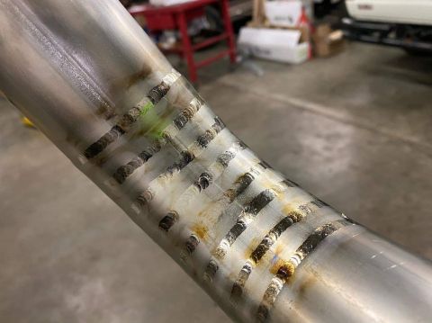 1996 Ford Bronco - 20200327 - Titanium charge pipes are being welded up.