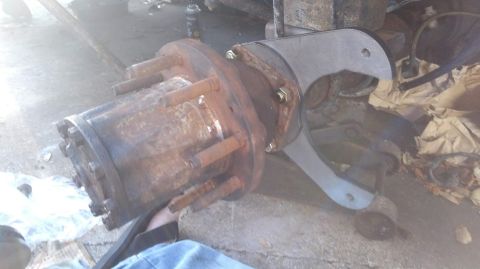 1996 Ford Bronco - the calipers should mount toward the back. the bracket can be flipped to get a slightly different clocking. might be important if the leaf…