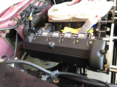 1992 Ford Crown Victoria - Close-up view of a car engine during a rebuild, showing internal components.