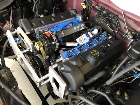 1992 Ford Crown Victoria - The engine bay shows a Ford V8 engine with new intake manifold gaskets and a rebuilt alternator.