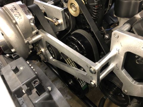 1992 Ford Crown Victoria - The engine bay shows a supercharger system with various pulleys and belts, some components are marked with handwritten numbers.