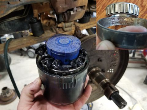 1997 Ford F-250 - Since the driver's bearings were good, I pulled the passenger's hub off. By the time I got the brakes off, I could feel the roughness, but…