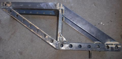 1992 Ford Bronco - Bed mount added, using the hole previously drilled for the unistrut tie-down.