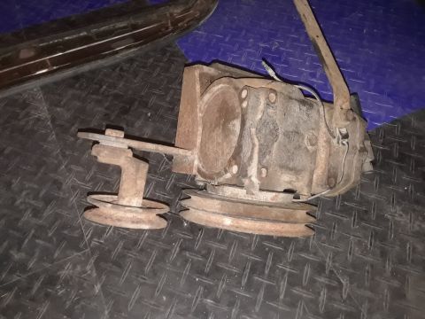 1994 Ford Bronco - This is a vehicle transfer case with attached pulleys, likely removed from a larger machine.