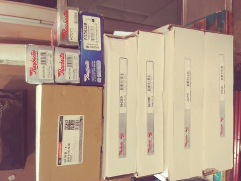 1996 Ford Bronco - Various boxes of automotive brake parts are stacked, with some labels indicating "Raybestos" and "Ford Motorcraft".