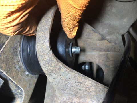 1980 Ford Bronco - Installing a new bushing on a vehicle's suspension system.