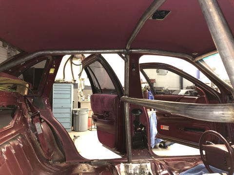 1992 Ford Crown Victoria - The interior of a 1992 Ford Crown Victoria shows a custom roll cage installation.