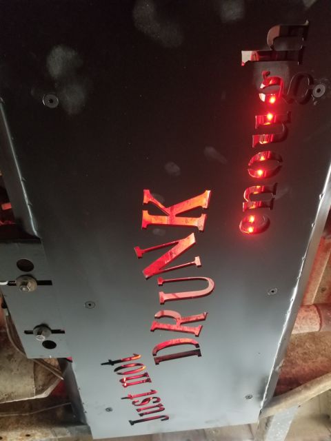 1996 Dodge 1500 - This custom plate with illuminated lettering is mounted to the underside of a vehicle.