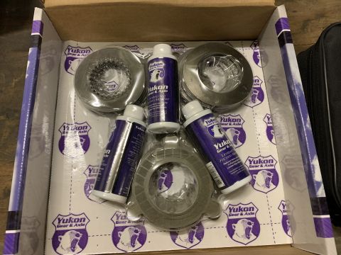 2002 Ford Excursion - Box of Yukon Gear & Axle friction modifier and clutch pack parts.