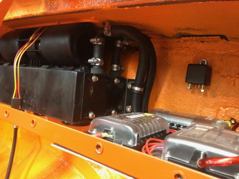 1992 Jeep Wrangler - Close-up view of automotive electrical components and wiring within an orange interior.