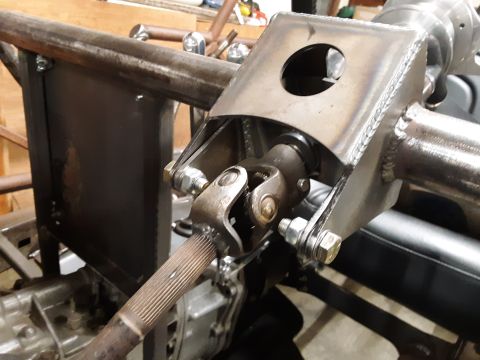 1985 Toyota Hilux - Custom steering column bracket and U-joint assembly, likely for a modified vehicle.