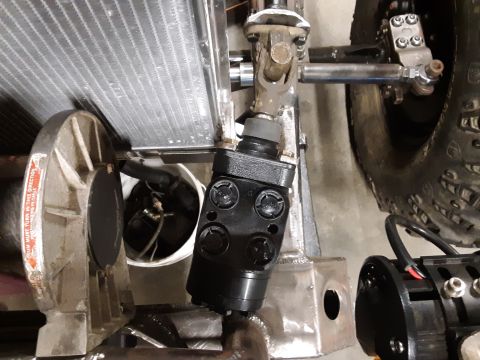 1985 Toyota Hilux - Close-up view of a steering mechanism and radiator assembly.