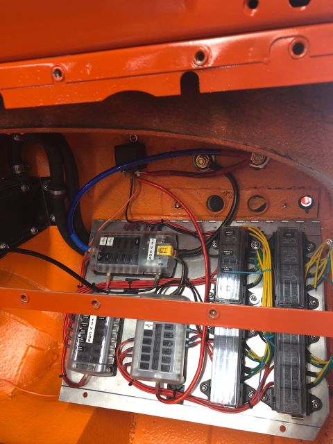 1992 Jeep Wrangler - Close-up of a vehicle's electrical fuse box and associated wiring, showing multiple fuse holders.