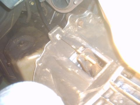 1991 Ford LTD Crown Victoria - A close-up view of an engine part, possibly related to the oil pan or a similar component.