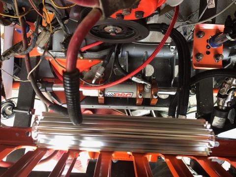 1992 Jeep Wrangler - Close-up of engine bay components including a hydraulic cylinder and heat sink.