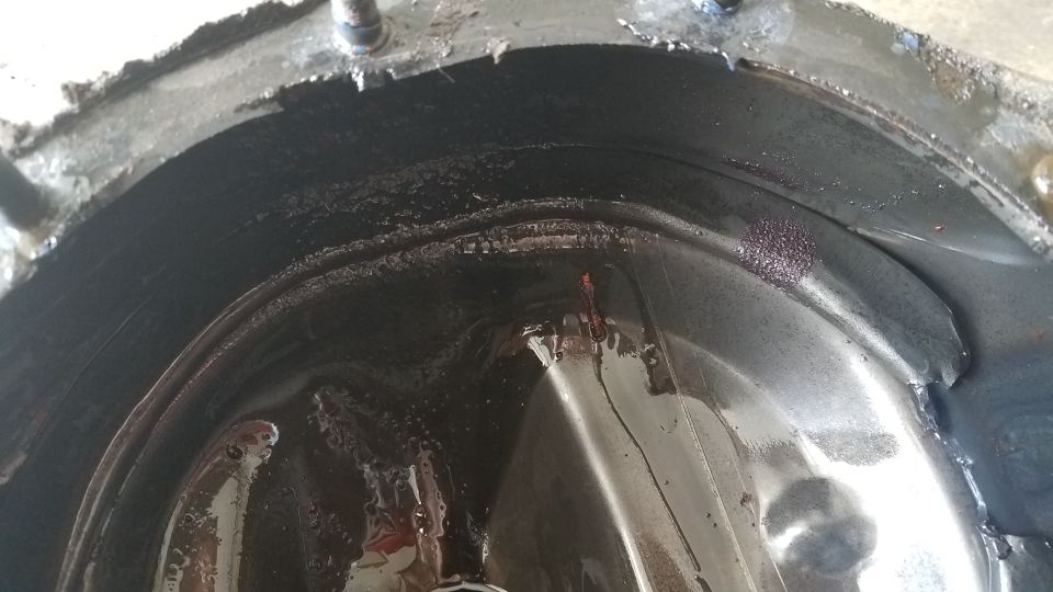 Interior of a dirty differential housing with some rust spots