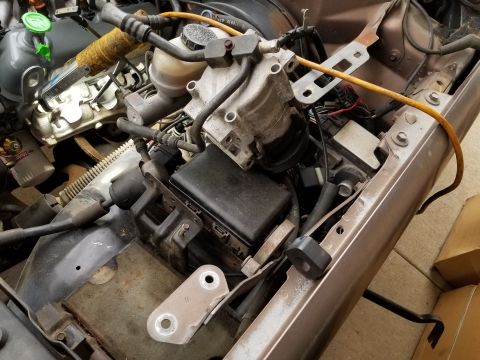 1993 Ford F-250 - I replaced both engine mounts & the trans mount with my own fabricated polyurethane ones. Before tightening them down, I used a long prybar…