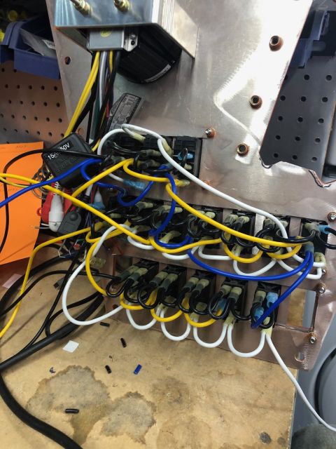 1992 Jeep Wrangler - A jumble of wires and electrical connectors are visible in this close-up shot of a vehicle's wiring system.