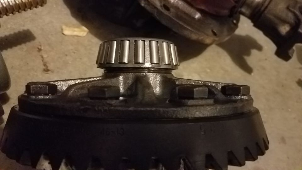Differential gear set with bearing and visible teeth and text "46-13"