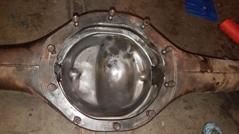 1985 Ford Bronco - This differential housing shows significant damage and wear, contradicting the claim of a 1985 Ford Bronco part.