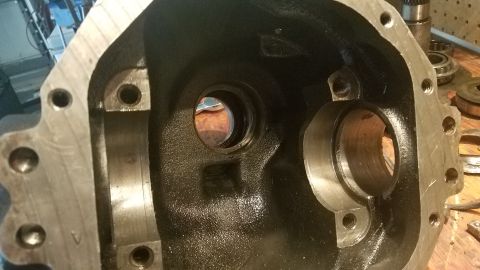 1985 Ford Bronco - Close-up view of the interior of a differential housing, showing bearing races and mounting holes.