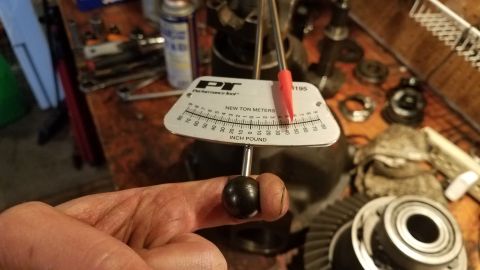 1985 Ford Bronco - A torque wrench is used to measure the force applied to differential components.