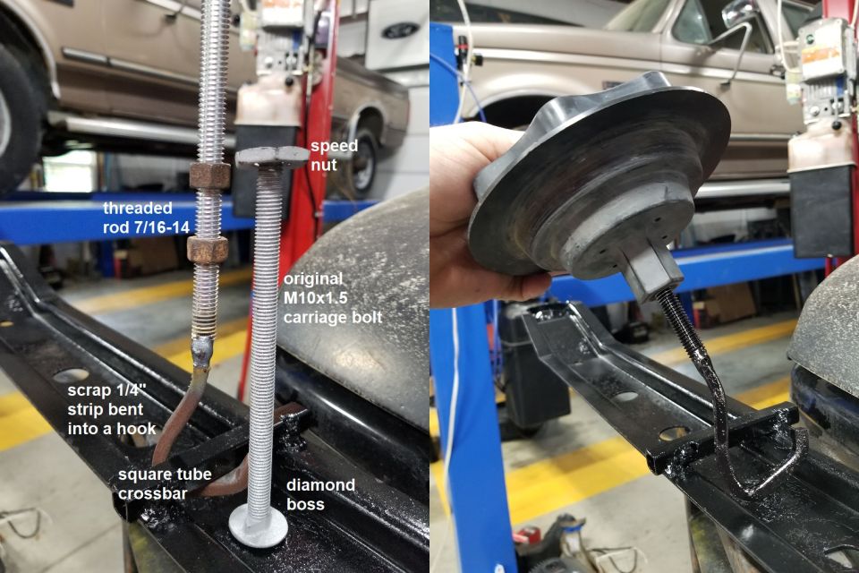 Homemade tow hook repair using threaded rod and bent metal strip on a square tube crossbar. A vehicle is visible in the background