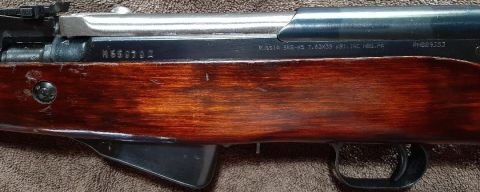 2003 Ford F-250 - The receiver of a Russian SKS rifle is shown, with visible serial numbers and caliber markings.