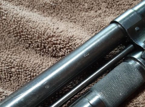 2003 Ford F-250 - Close-up view of a firearm barrel and grip, with a watermark visible.
