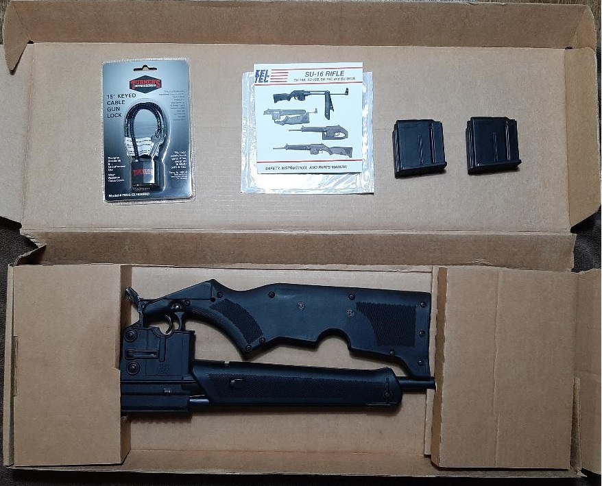 SU-16 rifle kit in cardboard box with gun lock and magazines