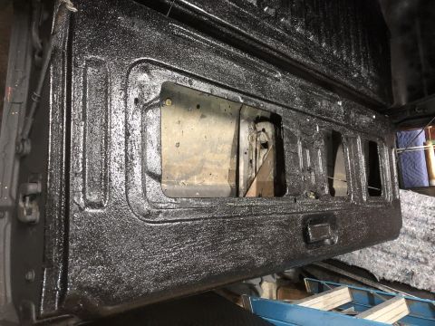 1978 Ford Bronco - The textured black liner covers the interior of the truck bed and tailgate.