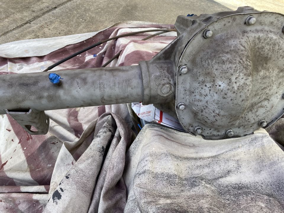 Differential housing and axle tube on a cloth.