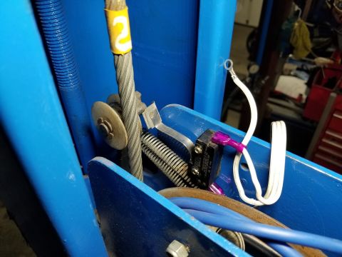 2004 Land Rover Land Rover - To make the LEDs automatic, I wired them to this paddle switch. When I lower the lift onto the locks, the cable goes slack, allowing the sp…