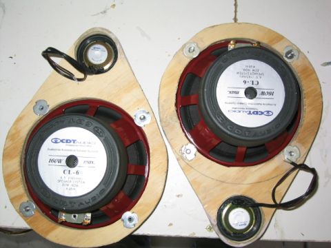 1989 Ford Bronco - Two CDT Audio CL-6 6.5-inch component woofers rated 160W max / 80W RMS at 4 ohms, bolted to teardrop-shaped plywood baffle rings alongside…