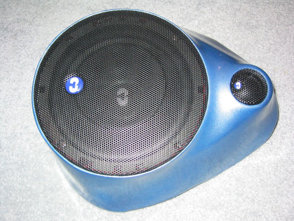 Metallic blue fiberglass speaker pod with mesh woofer and tweeter grilles