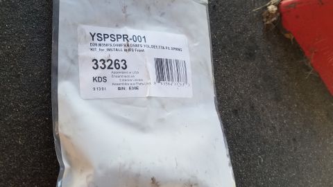 1985 Ford Bronco - A close-up of a parts package labeled "YSPSPR-001" with a barcode and part number "33263". The package appears to be for an IFS front sprin…
