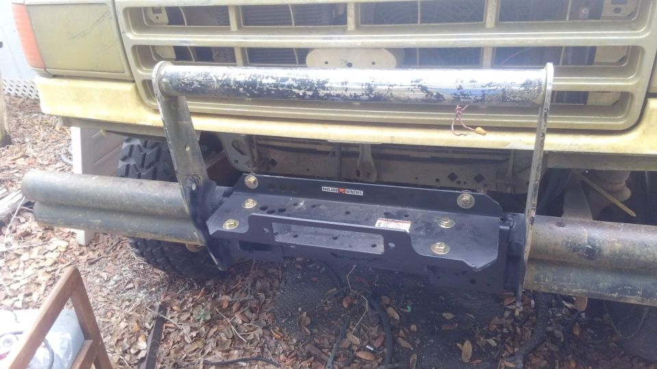 winch plate is bolted on with (6) 1/2 inch grade 8 bolts. it should be plenty strong

i cut the sharp corners off the winch plate to prevent from hurting myself in the future