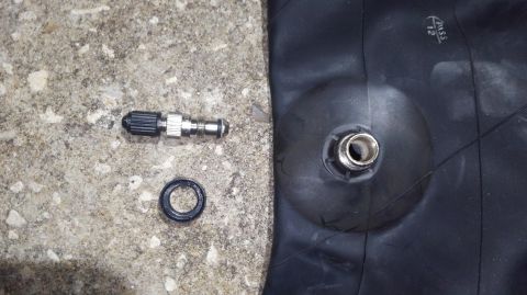 1988 Ford Bronco - these Firestone 551236 tubes have a removeable stem for filling with water. i wont be using that feature but they do have a nut for retaini…