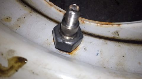 1988 Ford Bronco - 1/2"-20 nuts hold the stem perfectly. some of the wheels i had to drill the hole to 5/8" while some wheels were already 5/8.