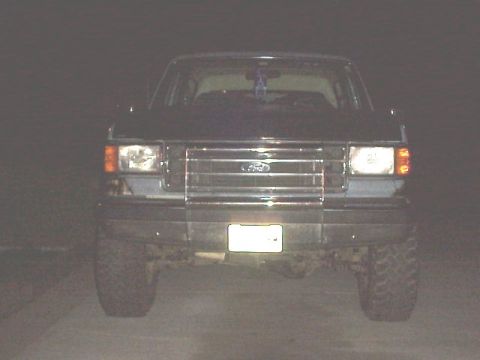 1989 Ford Bronco - Front view of a 1989 Ford Bronco, showing its grille and headlights.